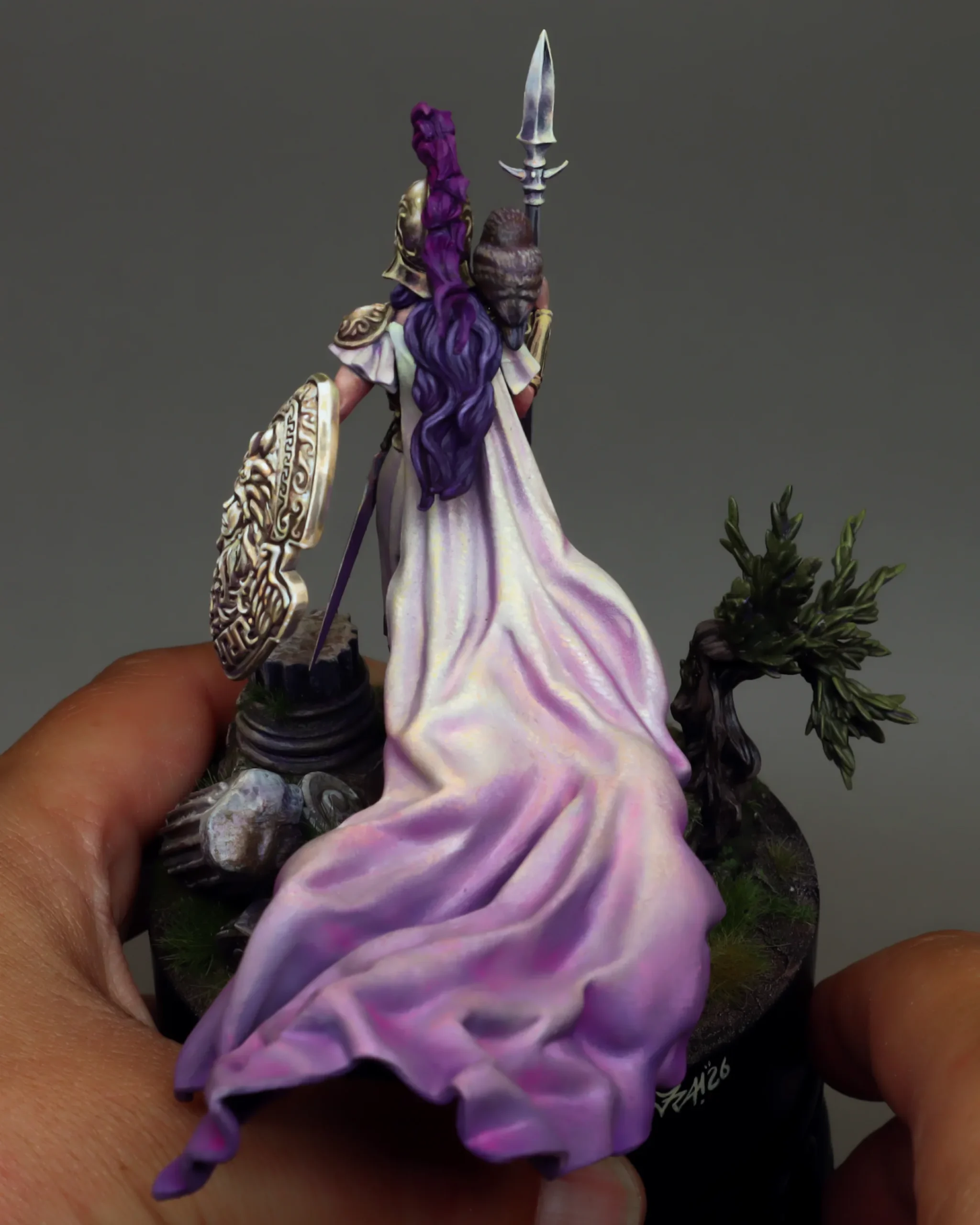 Athena 75mm resin miniature, close-up in hands showing sculpt detail and 75mm size